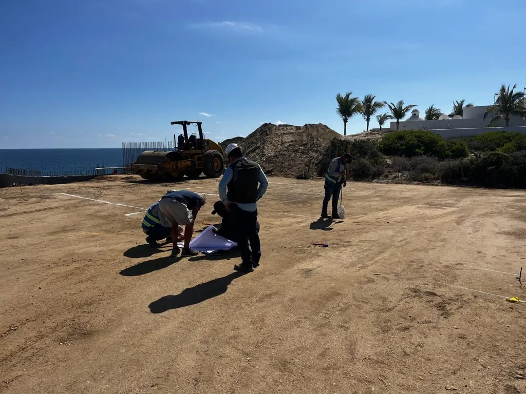 Team laying out the project on the building site